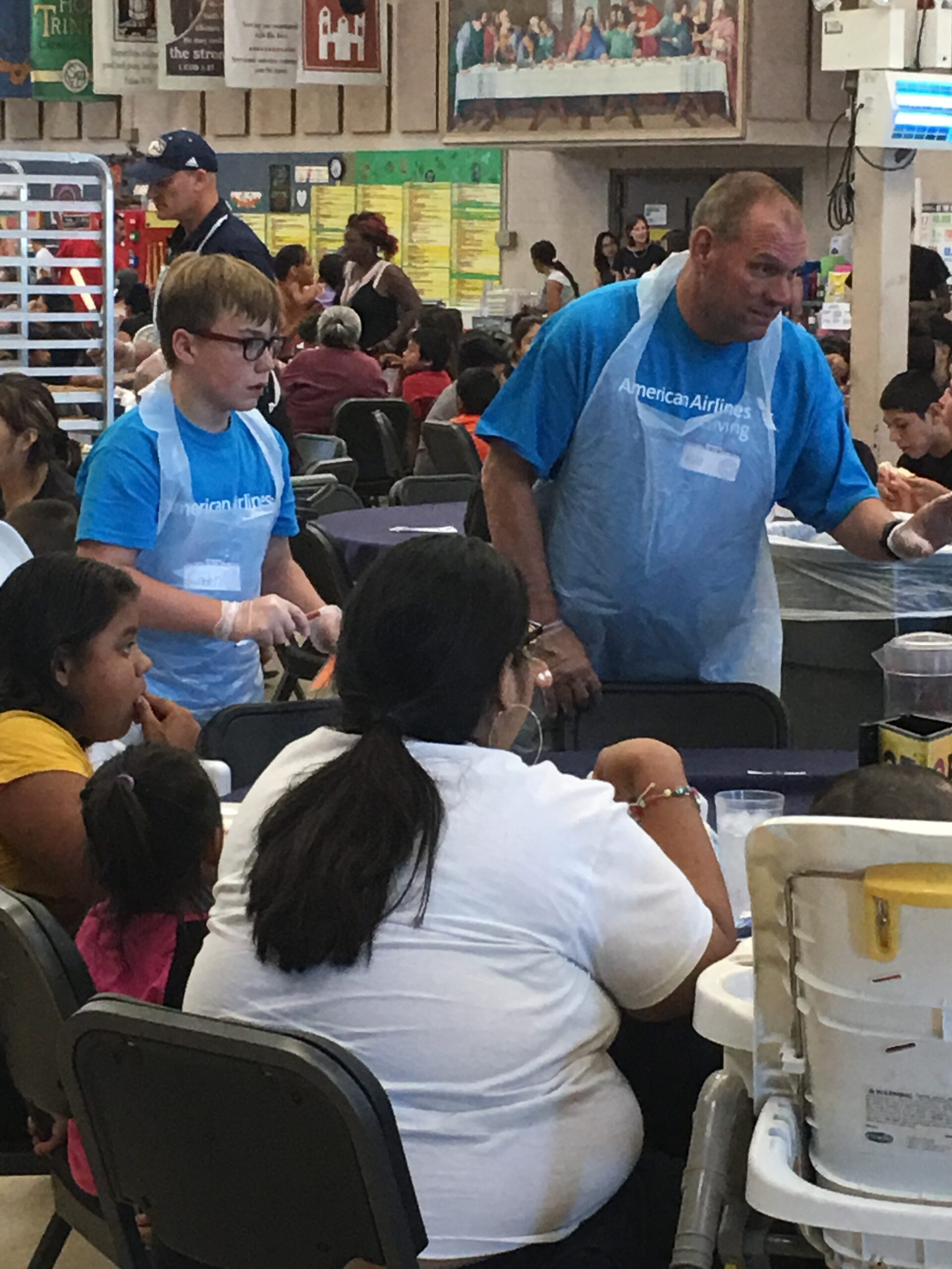 Bill and son serving at St. Vincent de Paul, Phoenix
