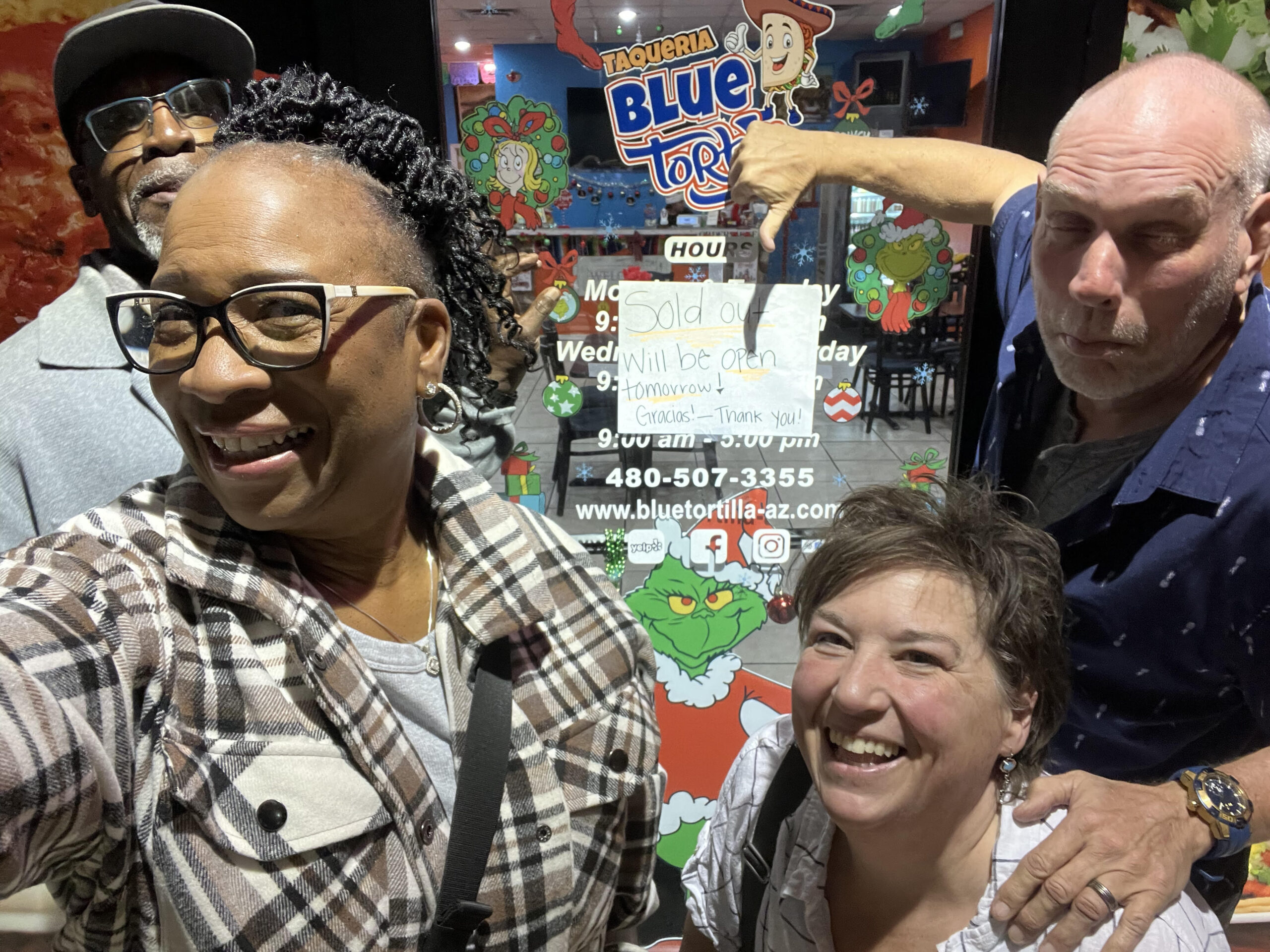 Two couples together at a casual gathering, sharing life